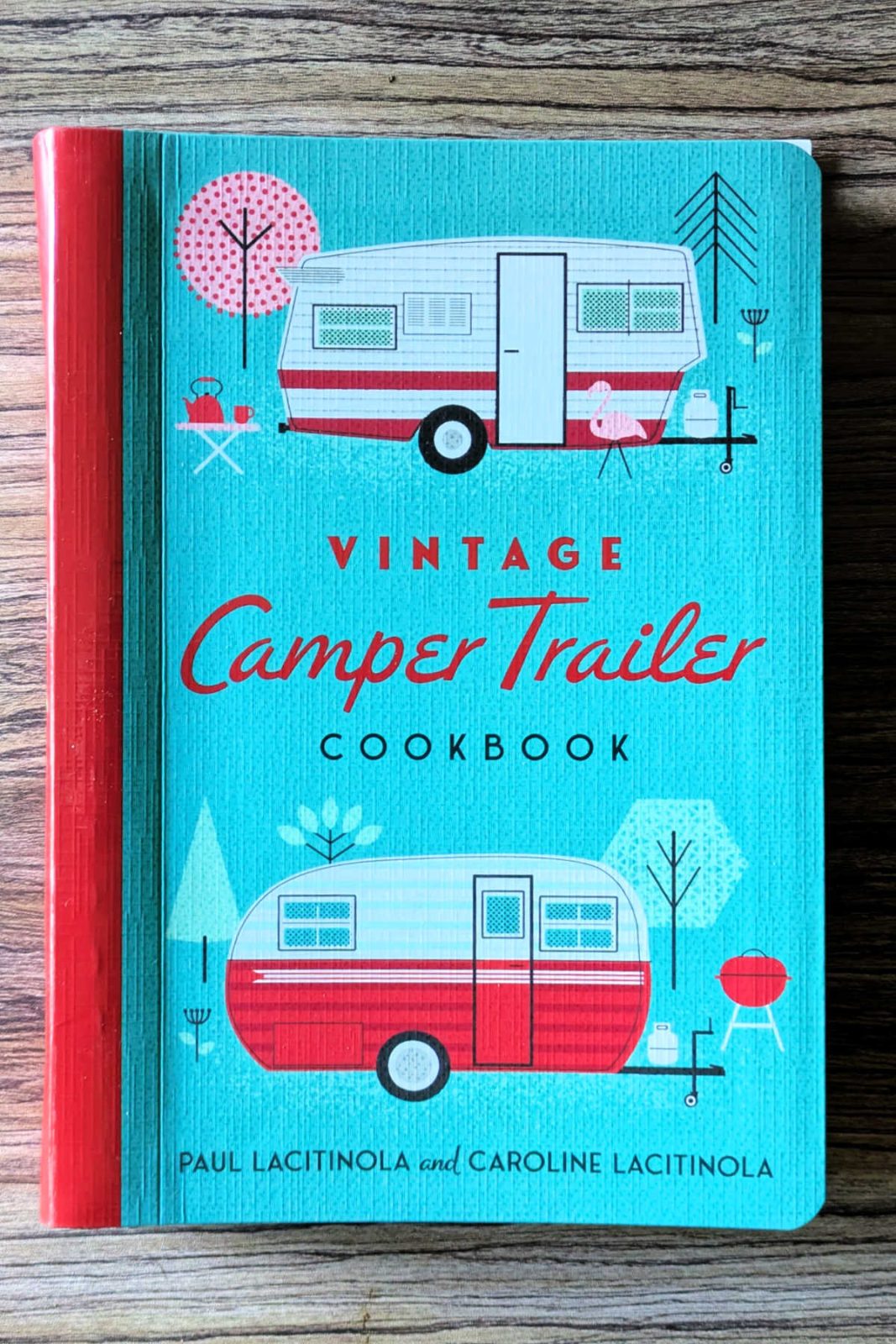 Hit the road with the Vintage Camper Trailer Cookbook! This spiral-bound collection features over 140 comfort food recipes, retro photos, and nostalgic fun perfect for outdoor cooking or making at home.