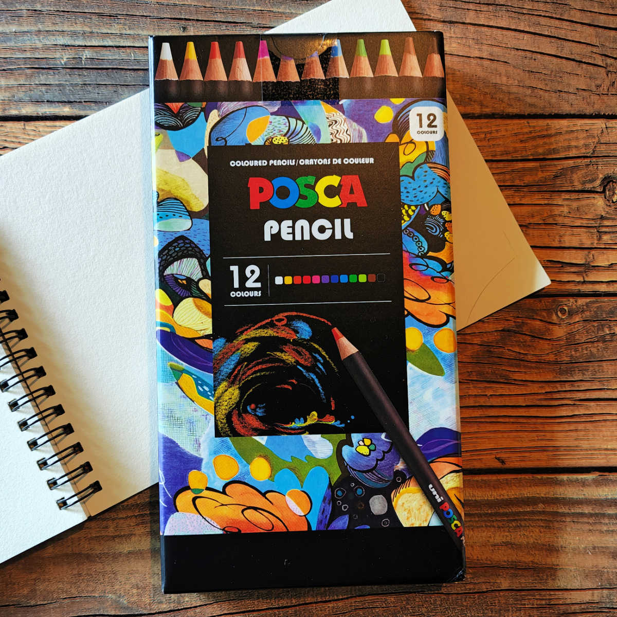 box of posca colored pencils