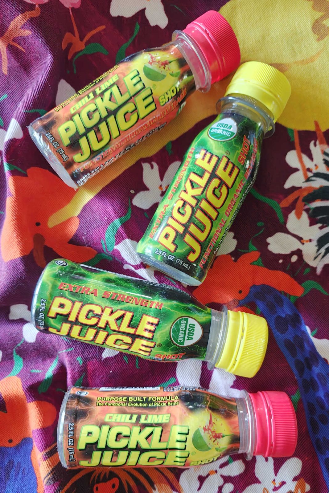 Pickle Juice Sports Drink Strength Shots are USDA organic, sugar free, and caffeine free. Available in Original Pickle and Chili Lime, these 2.5 oz shots are packed with electrolytes and contain no artificial ingredients - perfect for strenuous workouts! 🥒
