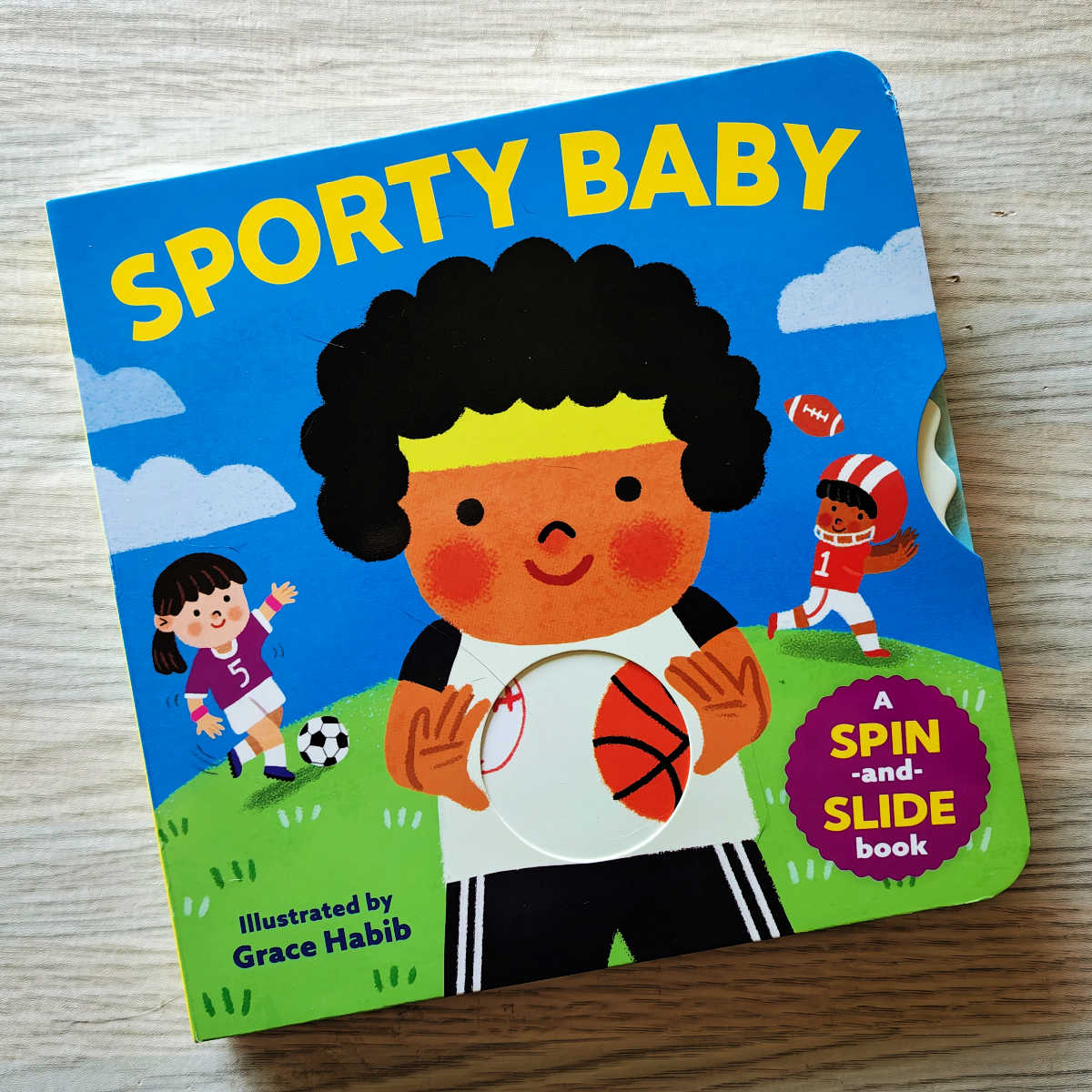Get ready for a slam dunk with Sporty Baby! ⚽ This action-packed board book features vibrant colors, cute characters, and sturdy moving parts to help your little one explore 8 different sports. It's a good gift for a birthday! 🏆