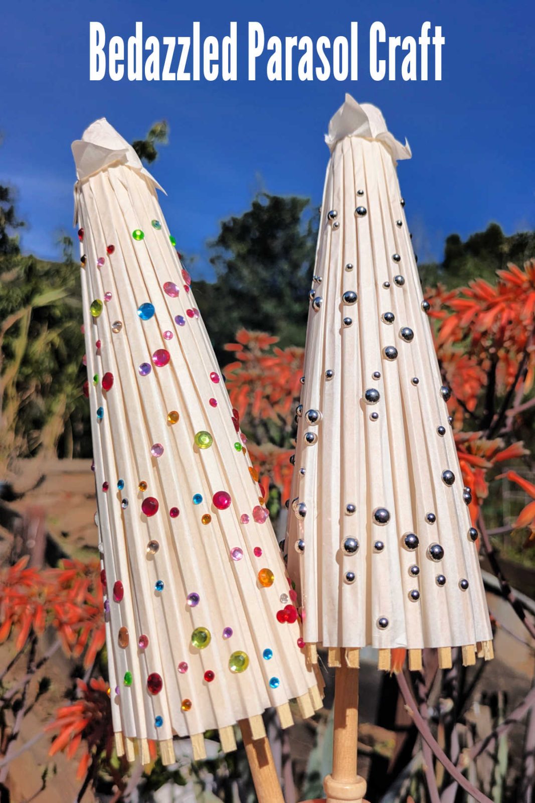 Looking for a simple and sparkling activity? This DIY bedazzled parasol craft is perfect for toddlers and big kids alike using paper umbrellas and gem stickers!