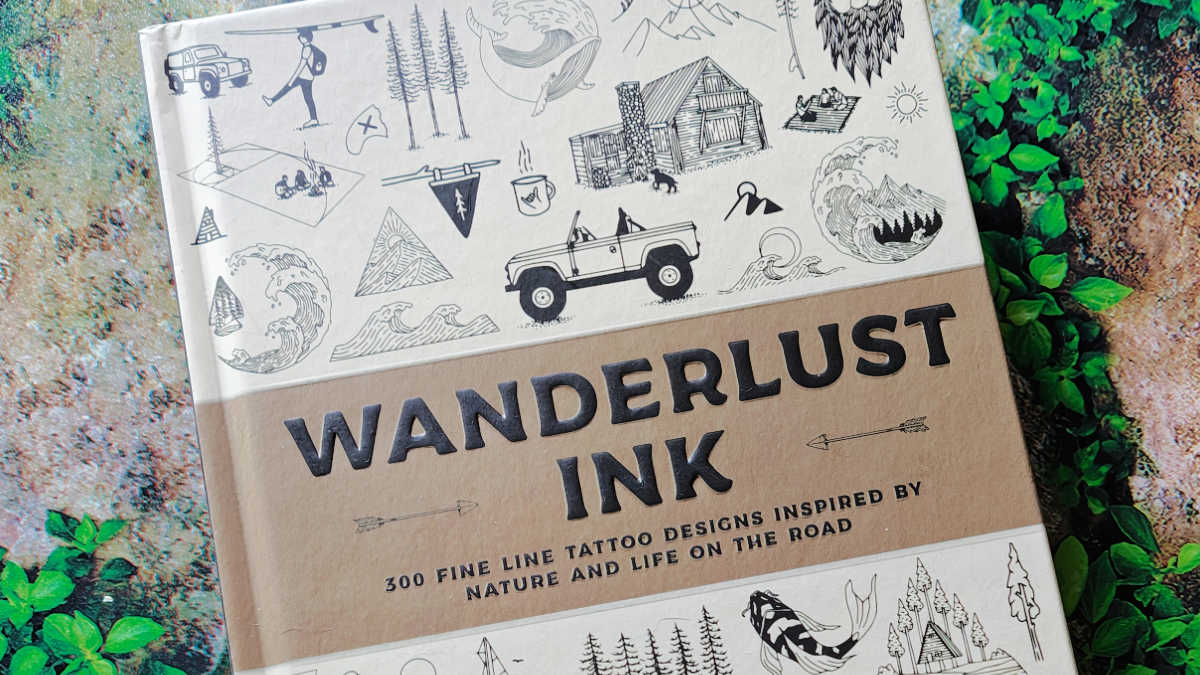 fine line tattoo book wanderlust ink