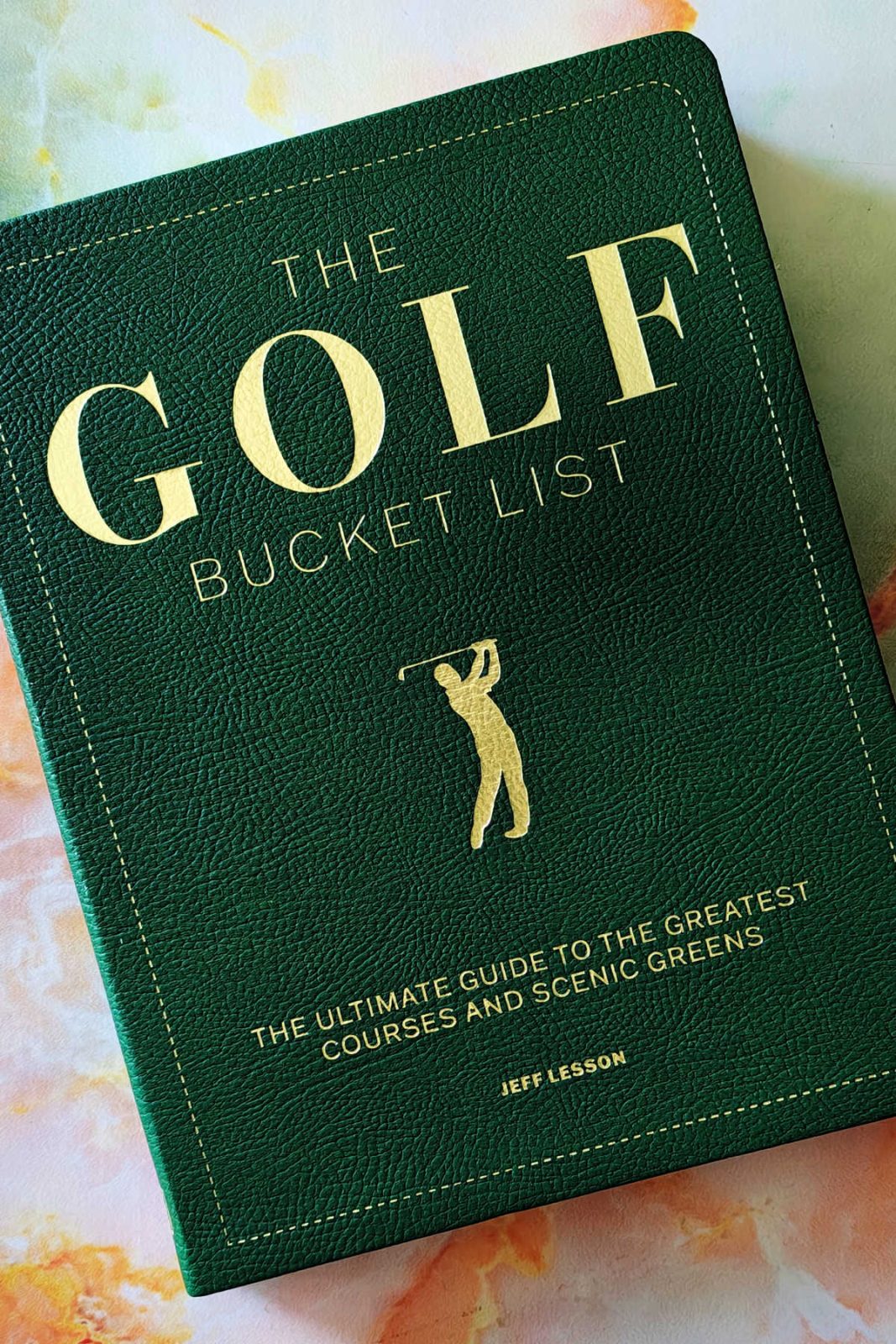 This review of The Golf Bucket List highlights why this interactive journal makes an excellent Father's Day gift for golfers. Discover how its premium vegan leather binding and tracking sections help golfers log their achievements across elite US and international courses.