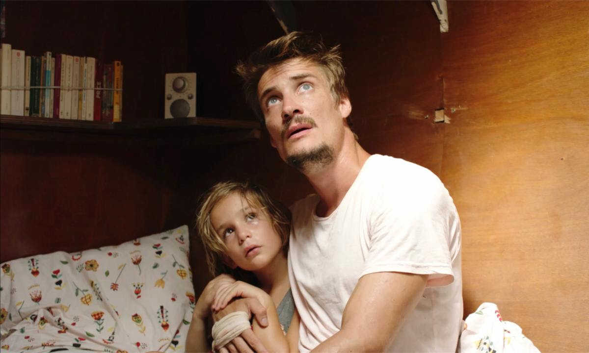 child and man below deck