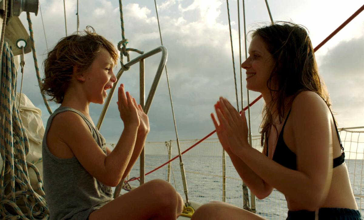mom and child on sailboat