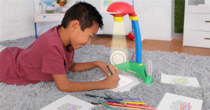child tracing pictures with the Lakeshore Learning Trace and Draw Projector Lamp